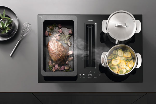 Индукционная варочная панель Miele со встроенной вытяжкой. Особенности Индукционная варочная панель Miele со встроенной вытяжкой. Особенности